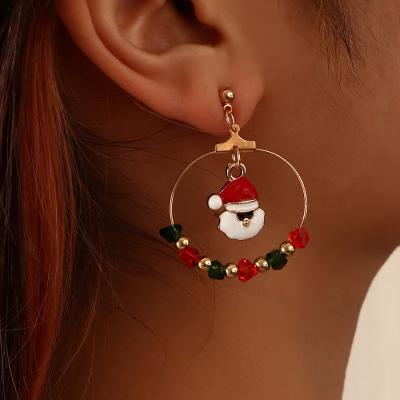 China 2021 fashion European simple Christmas snowman drop cute asymmetrical retro Christmas tree and American oil winding earrings for sale