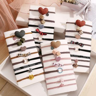 China Fashionable 8pcs/Set Mix of Elastic Band for Girls Hair Band Rubber Band for Hair Cute Acrylic Heart Flower Kids Cube Ring Rope for Kids for sale