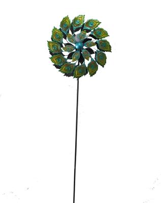 China Garden Decoration Metal Garden Peacock Feather Wind Spinner Solar Light Yard Stake for sale