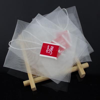 China Nylon Tea Heat Seal Filter Tea Bag For Herbal Tea With Bag Size 58X70mm for sale