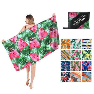 China Customized Compressed Summer Sublimation Printing Microfiber Quick Dry Beach Towel With Logo for sale