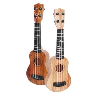 China Nanyang 21 Inch Soprano Wood Ukulele Solid Top Mahogany With Ukulele Accessories With Gig Bag for sale