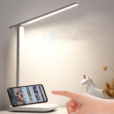 China Modern LED Desk Lamp Brightness Smart Adaptive Eye Protect Study Desk Folding Table Lamp Dimmable Bedside Revealed Night Lights for sale