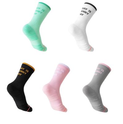 China Breathable Professional Cycling Crew Socks for Men and Women New Plaid Pattern with Medium Length Seamless Technique for Spring Sports for sale