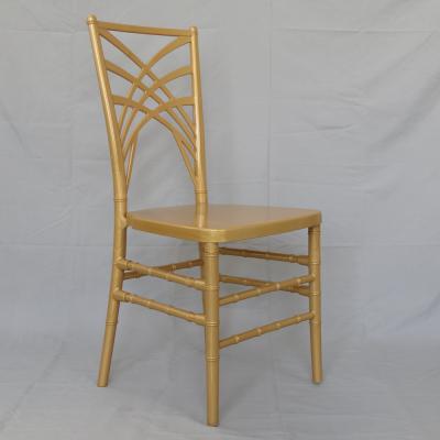 China Resin Stackable Plastic Cross Gold PC Back Chair For Event Party Banquet for sale