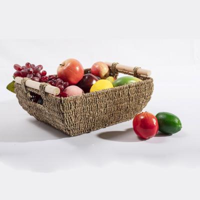 Cina HBK Vegetal Plankton Sustainable Boat Shape Natural Rattan Storage Basket With Wooden Handle in vendita