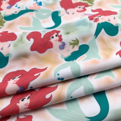 China 88% Polyester 12% Spandex Anti-Static Hot Swimsuit Fabric Custom Colorful Cartoon Soft Knit Digital Print On Fabric for sale