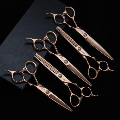 China Right handed scissors streamline design and ergonomic handles hair scissors rose glod hair cutting shears for sale