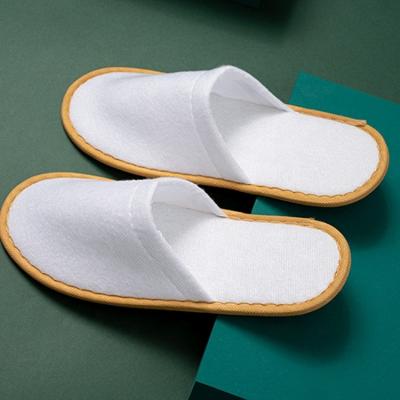 China Wholesale Custom Eco-friendly Exquisite Disposable Hotel Amenities Five Star Amenities Hotel Use Disposable Canvas Home Slippers For Woman And Man Hotel Slipper for sale