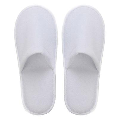 China Eco-friendly Exquisite Disposable Hotel Amenities Wholesale Indoor Hotel Guest Slippers Cheap Unisex White Breathable Soft Slippers Disposable for sale