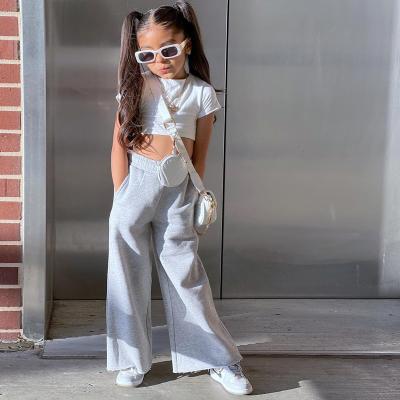 China Other Hot Selling 2022 Summer Y0085 Solid Color Casual Tight Sexy Navel T-shirt Loose Wide-leg Pants Girls Two-Piece Clothing for sale