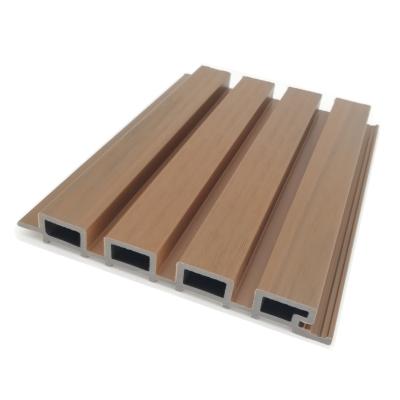 China Outdoor Capped Composite Solid Fluted WPC Panel Board Coextruded Cladding for sale