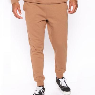 China Cheap wholesale custom drawstring sewatpants men Anti-wrinkle prices elastic waist jogger pants solid color for sale