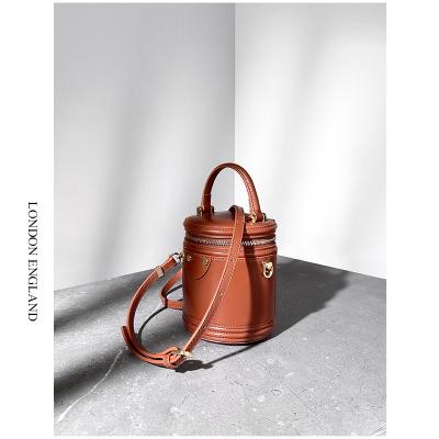 China ODM brand design mini bucket bag fashion logo small leather custom single round shoulder cross bag for women for sale