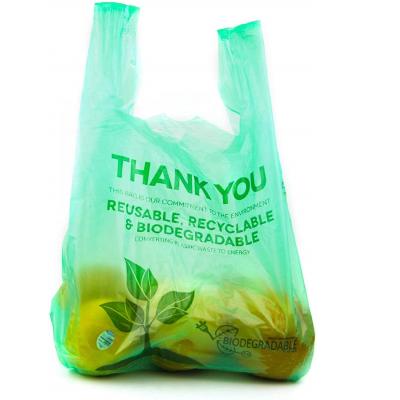 China 100% BIODEGRADABLE Biodegradable Supermarket T-shirt Handle Shopping Bag Biodegradable Plastic Waste Bags for sale