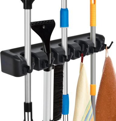 China Modern Wall Mounted Organizer Strong-Handle Wall Mounted Broom and Broom Holder Holds with 5 Slots, 6 Hooks for sale