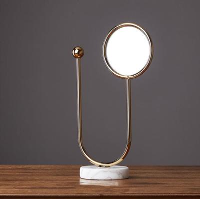 China Minimalist Custom Decorative Standing Around Mirror Two Side Gold Decorative Stand Desk for sale