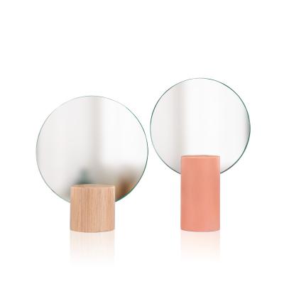 China Minimalist Wooden Glass Standing Makeup Mirror Dressing Small Decorative Mirror for sale