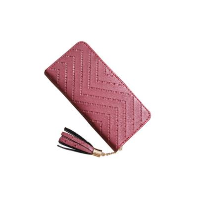 China Newest Trend Long Card Holder Wallet Waterproof Embossed Lady Leather Wallet With Tassel Zipper for sale