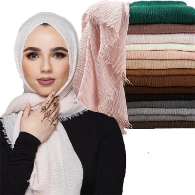 China 2021 fashion products simple color excellent fantastic warm squishy style fold cotton wholesale hijab for sale