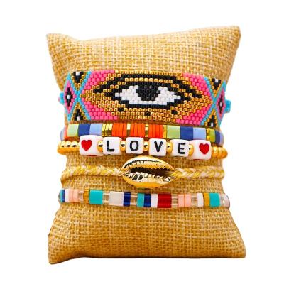 China BOHEMIA Custom Roxanne Miyuki Evil Eye Gold Shell chian Hand woven String Rainbow letter Beads friendship charms for women bracelets Set for sale