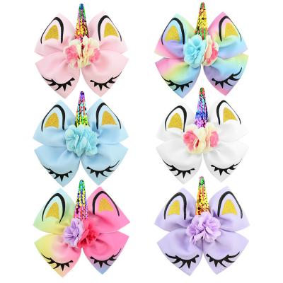 China Soft Hot Stamping Bow Unicorn Hair Ribbon Clips for sale