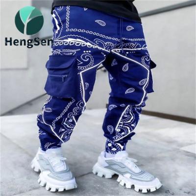 China Anti-wrinkle sports polyester pants hip hop jogging pants black printed casual wholesale men's full sports pants jogger pants for sale