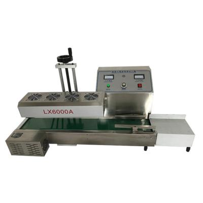 China 6000A Continuous Food Sealer / Capsule Aluminum Foil Induction Sealing Machine for sale