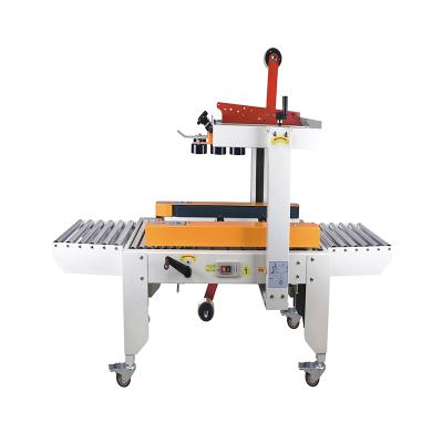 China Semi-automatic Food Factory FXJ4030 Small Carton Box Band Sealer Packing Machine for sale