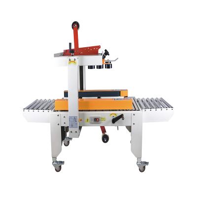 China FXJ4030 Food Carton Sealer Machine Semi-automatic Carton Box Sealer for sale