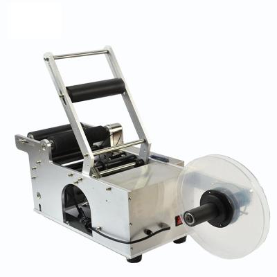 China Round bottle food factory price labeling machine automatic rolling labeling machine for sale