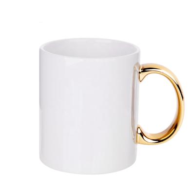 China Sustainable Newcomer Masks Mugs 11oz Sublimation Plated Mug Gold Handle Ceramic White Coffee Mug for sale