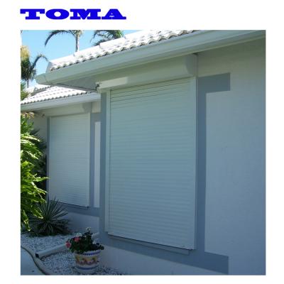 China TOMA modern hurricane shutter roller doors on sale with good quality roller shutter window for apartment en venta