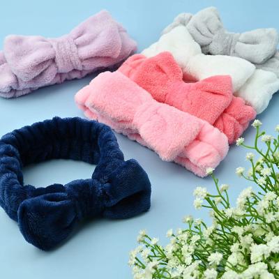 China Soft Bow Hairband Spa Headbands Bow Soft Elastic Hair Bands Coral Fleece Solid Color Headbands Hair Bands Makeup For Women Washing Face Shower for sale