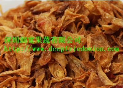 Cina Cipolla fritta nel grasso bollente saporita, cipolle fritte croccanti di colore dorato in vendita