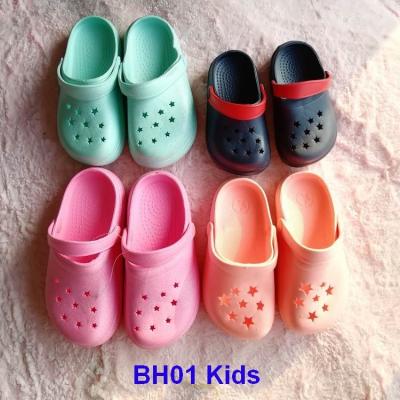 China Anti-Smell Stock Lot Shoes Kids Clogs Kids Hole Garden Shoes for sale