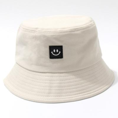 China European and American border leather bucket hat label style wide brim smiley embroidered simple sunshade sun women bucket hats 2022 for sale