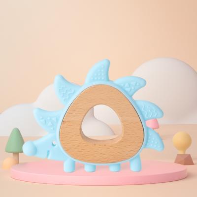 China New Design Silica Gel Baby Sensory Teether Toys Soft Wooden Teether Ring Kids Food Grade Silicone Baby Teether Bpa Free Hedgehog for sale