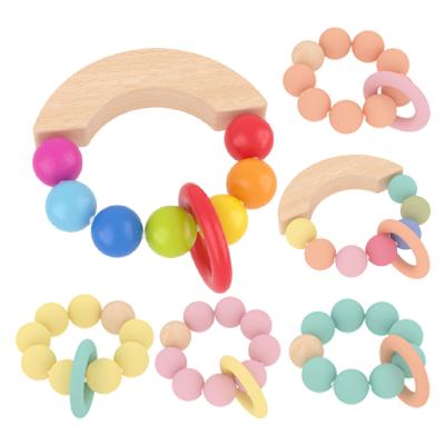 China New Design Silicone Sensory Baby Teething Rainbow Ring Kids Soft Silicone Toys Food Grade Wooden Teether for sale