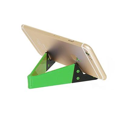 China Easy Install Simr V Shape Desktop Table Mobile Phone Tablet Stand Holder Plastic Folding Mobile Phone Tablet Desk Holder for sale