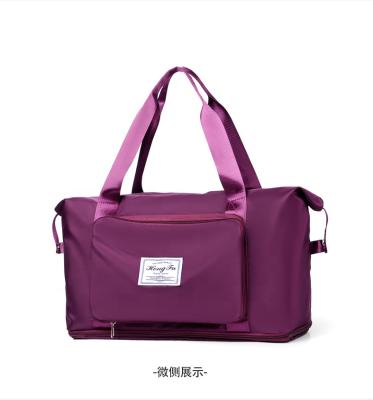 China 2022 Newest Design Durable Fashion Nylon Large Capacity Waterproof Cheap Ladies Travel Duffel Bags, Duffel Bags For Female Women for sale