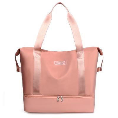 China Customized 2022 Design Fashion Pink Duffle Bag Women Waterproof Foldable Travel Bags With Shoes Pocket for sale