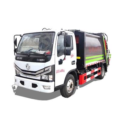 China Hotels factory supply DongFeng 4X2 7cbm garbage compactor truck with factory price for sale