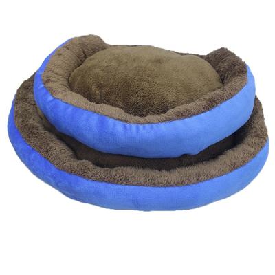 China Travel Long Plush Fluffy Pet Bed For Cat Anti Slip Sofa Dog Bed Donut Around Calming Dog Bed for sale