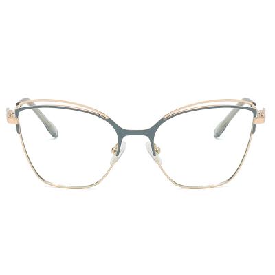 China 2022 black white feminino fashion blue light metal spring cat eye oculos blocking glass tr90 optical frames for sale