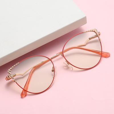 China 2022 Fashion Butterfly Temples Irregular Yellow Ochki Metal Blue Light Blocking Eye Glasses Reading Mini Slim Frameless for sale