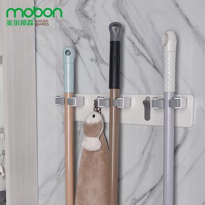 China Modern No Punch Multi Type Broom Mop Holder Non-marking Broom Clip Hook Holder Bathroom Suction Wall Hanging Nailless Holder for sale