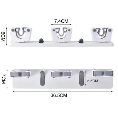 China Durable 2021 New Design Easy To Install Wall Mounted 3 Links Sticky Mop And Mop Hook For Bathroom for sale