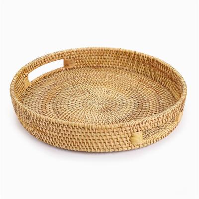 China Handmade Natural Woven Trays Tray With Handle Round Rattan Serving Bohemian Braided Basket Fruit Wooden Serving Viable Storage for sale