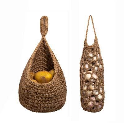 China Sustainable Hanging Jute Decorative Woven Magazine Basket 2Pcs Baskets Hand Woven Flower Storage For Flower Plants With Tassel for sale